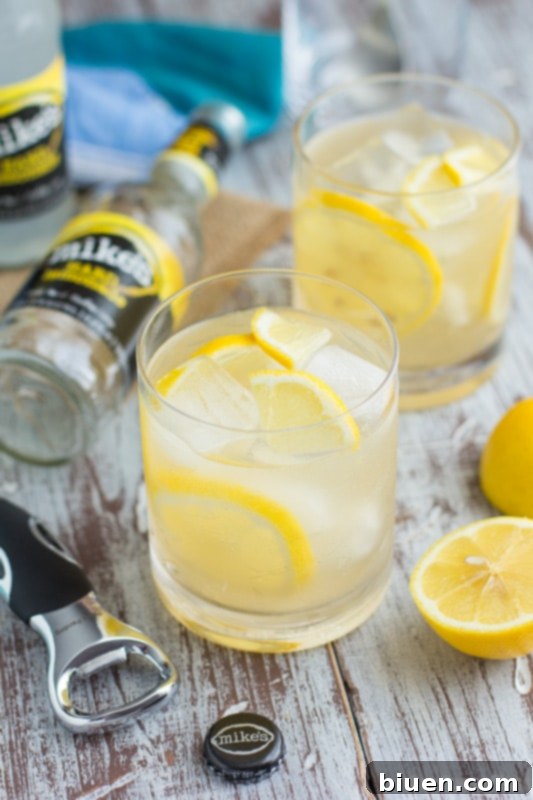 Thirsty Thursday Vanilla Bourbon Quencher 4 A decorative set of antique china plates displayed elegantly on shelves in a modern kitchen setting.