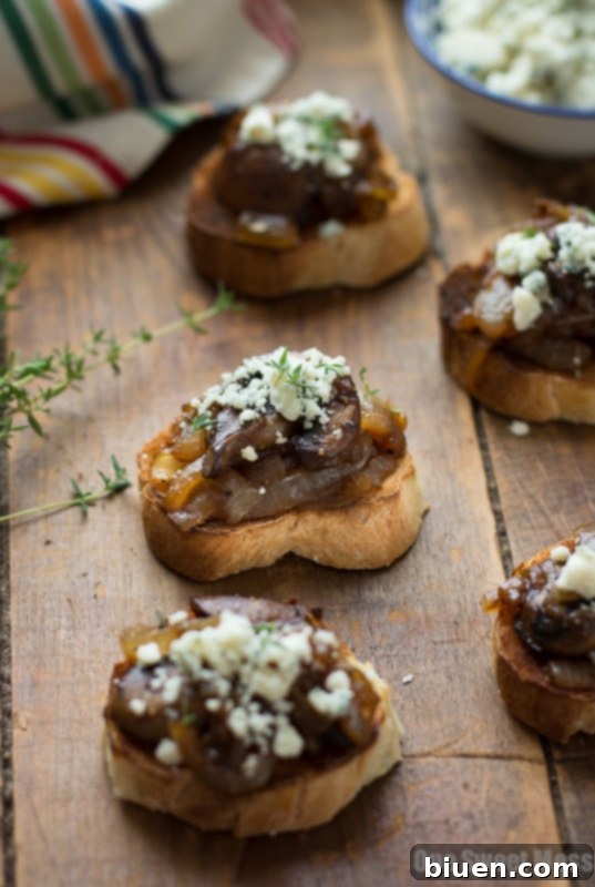 Caramelized Onion & Mushroom Crostini with Blue Cheese Crumbles