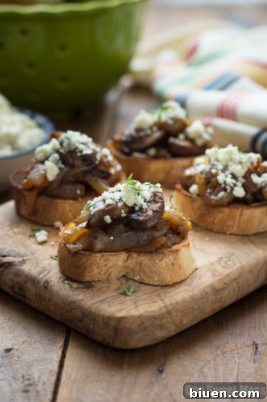 Caramelized Onion & Mushroom Crostini with Blue Cheese Crumbles