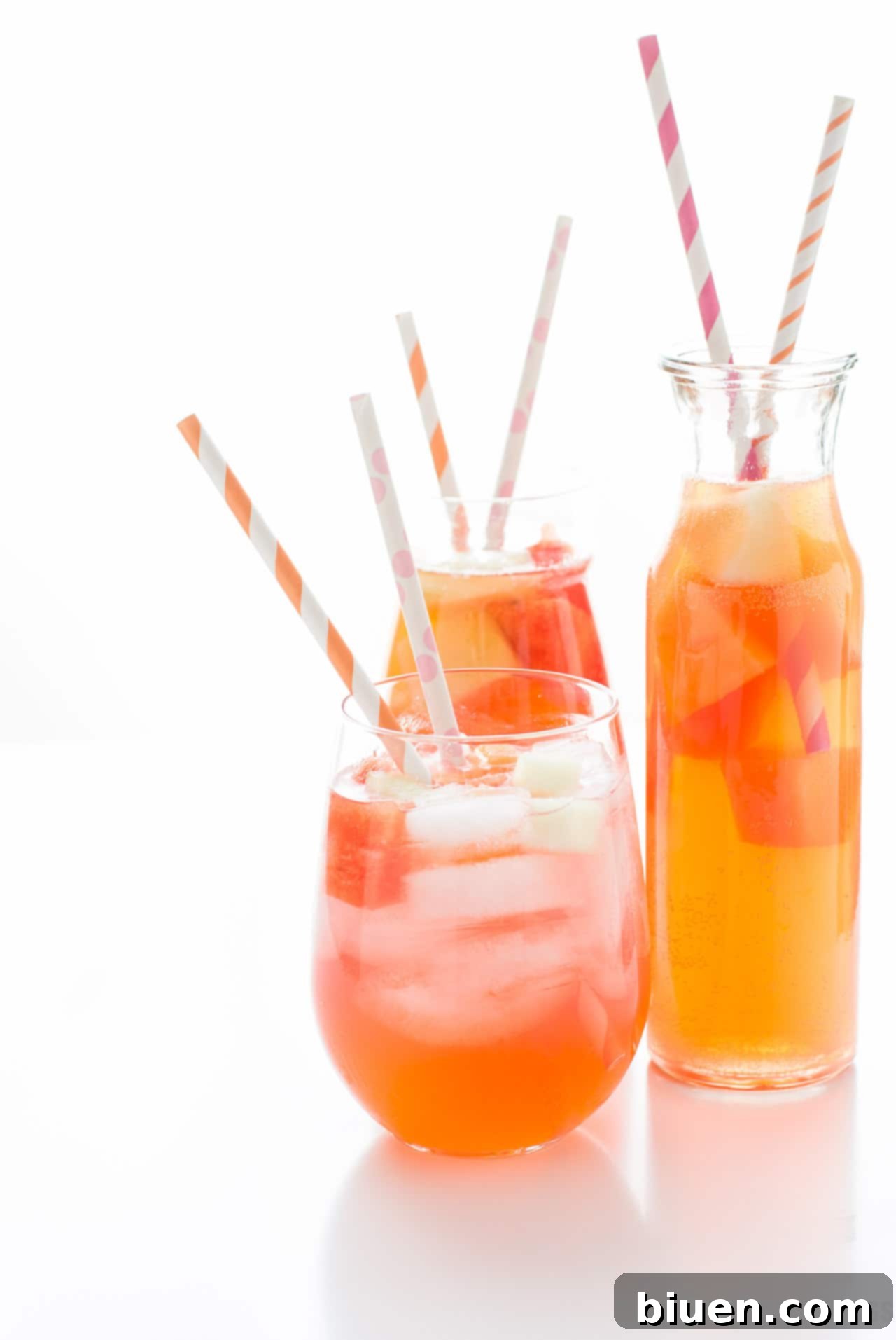 Sunkissed Melon Sangria 2 Refreshing Summer Melon Sangria pitcher with mixed fruit