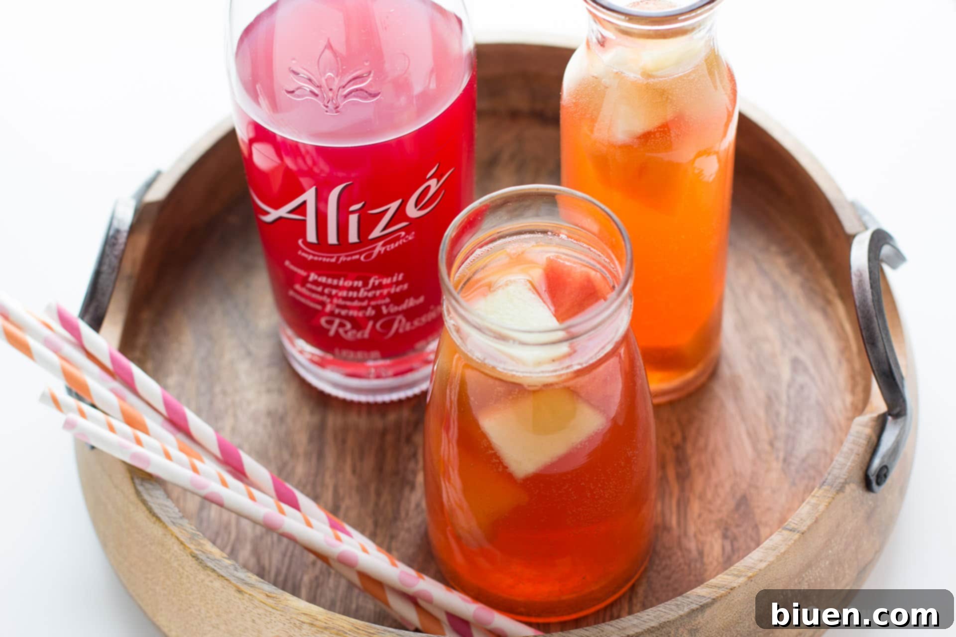 Sunkissed Melon Sangria 5 Alize Red Passion Liqueur bottle next to melon sangria