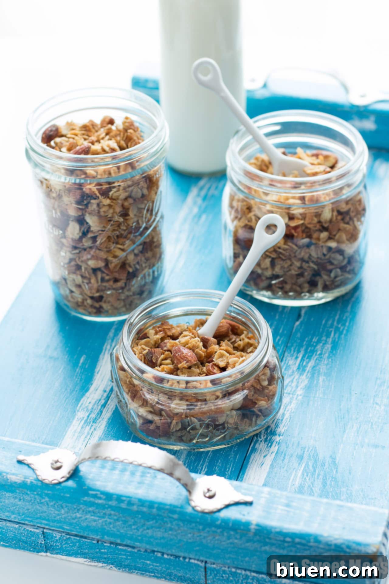 Rich Vanilla Almond Granola 13 Delicious and Crunchy Very Vanilla Almond Granola clusters ready for serving in a rustic bowl