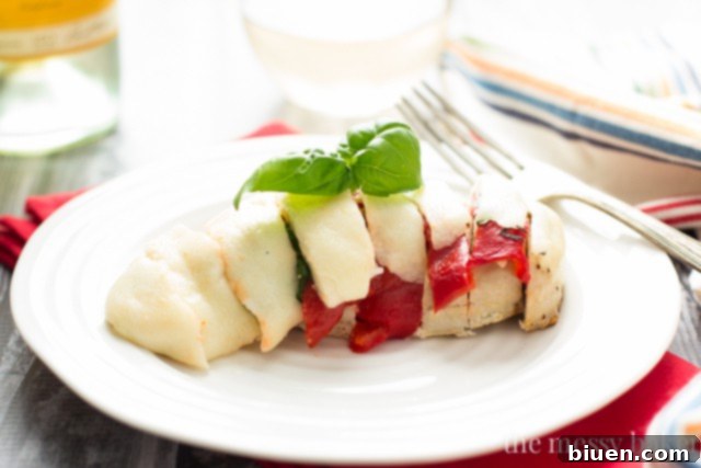 Your Week's Flavor Journey: August 24th Meal Plan 7 Roasted Red Pepper, Basil, and Mozzarella Chicken | www.themessybakerblog.com