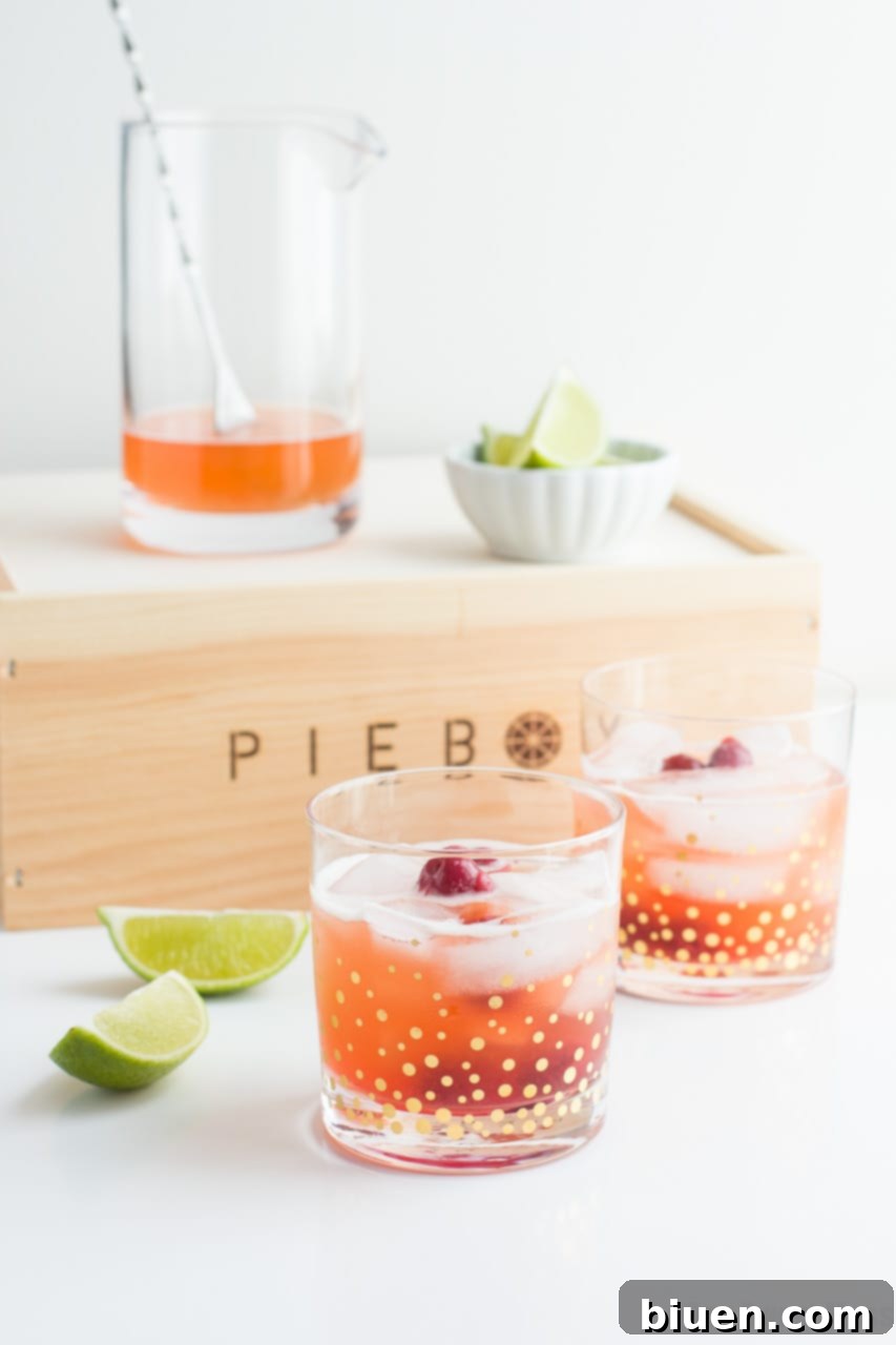 Shut Your Pie Hole (aka Cherry Pie) Cocktail, a sweet and boozy drink perfect for parties.