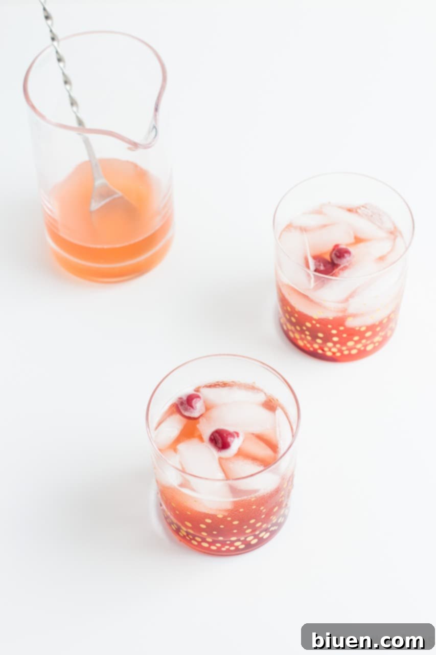 Serving the Shut Your Pie Hole cocktail in a glass with a cherry garnish.