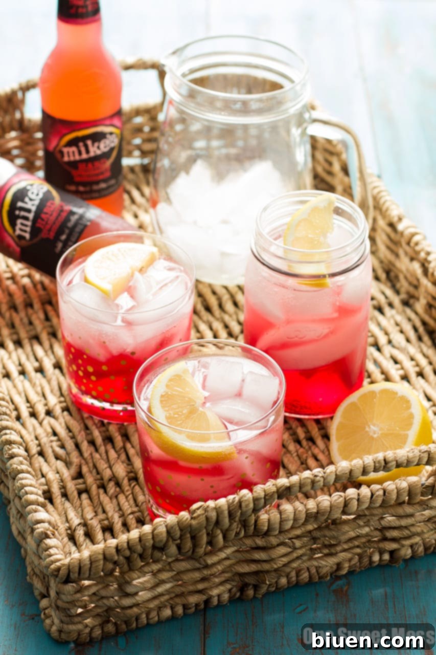 Cran-Apple Splash Cocktail | A mixture of mike's hard cranberry lemonade, apple cider, and apple-infused whiskey.