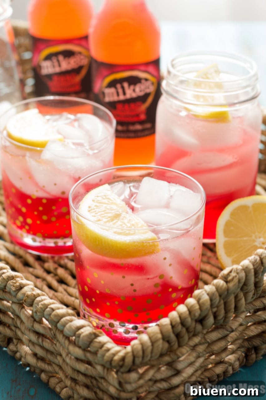 Cran-Apple Splash Cocktail | A mixture of mike's hard cranberry lemonade, apple cider, and apple-infused whiskey.
