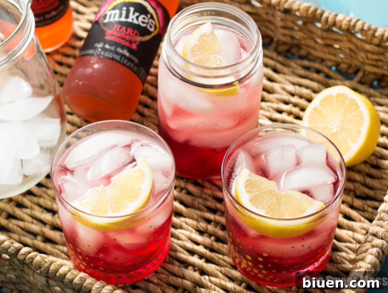 Cran-Apple Splash Cocktail | A mixture of mike's hard cranberry lemonade, apple cider, and apple-infused whiskey.