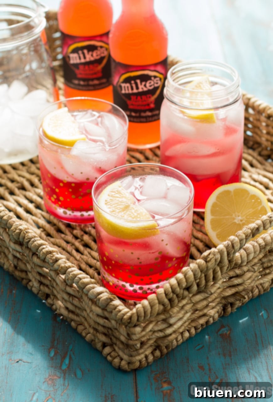 Cran-Apple Splash Cocktail | A mixture of mike's hard cranberry lemonade, apple cider, and apple-infused whiskey.