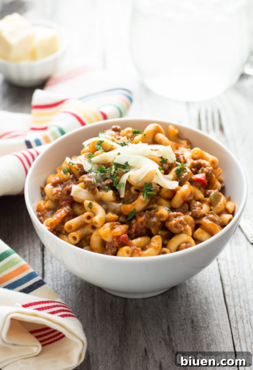 One Pot Chili Mac | Tender beef, gooey cheese, and pasta in one easy weeknight dish.
