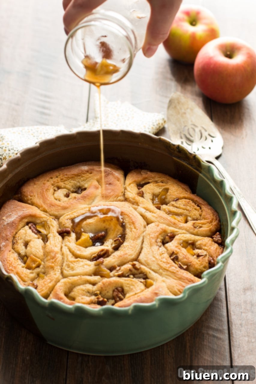 Caramel apple filling being spread on dough