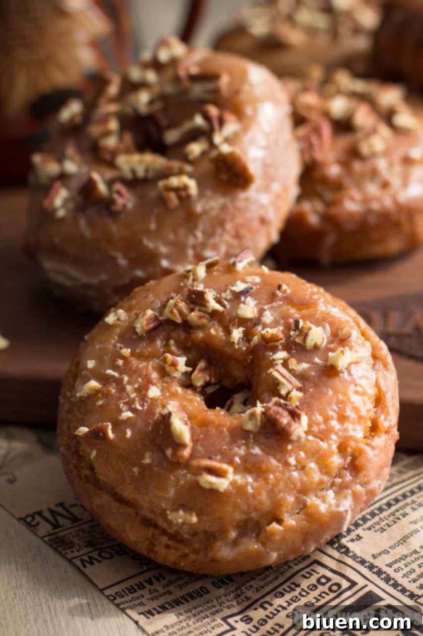 Pumpkin Spice Donuts with Maple Glaze