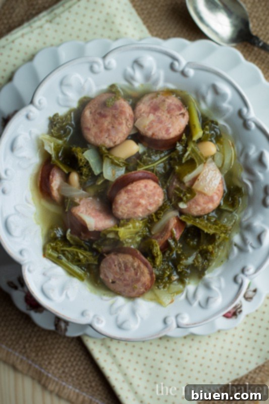 Slow Cooker Kielbasa Soup with Kale and White Beans | www.themessybakerblog.com