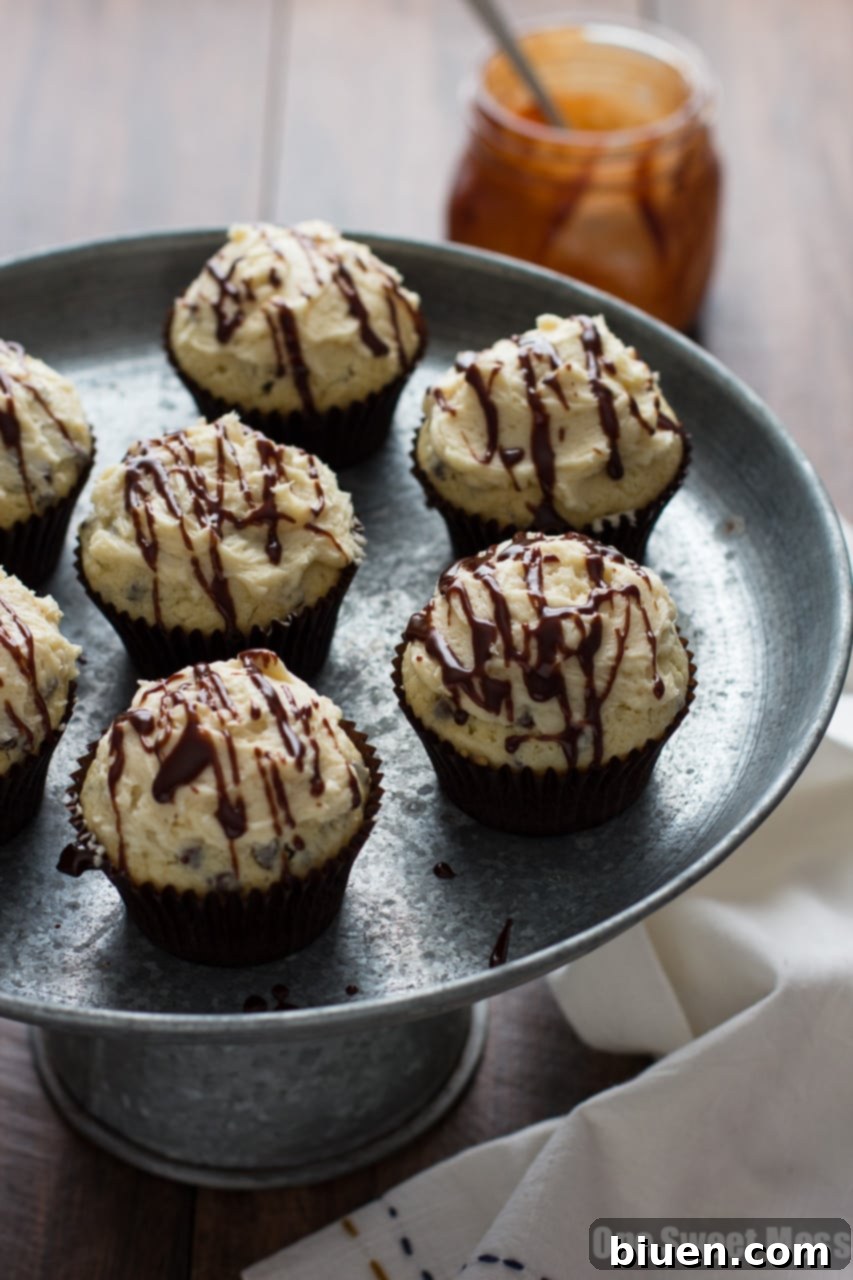 Fudge Stuffed Chocolate Chip Cupcakes with Malted Milk Buttercream Frosting