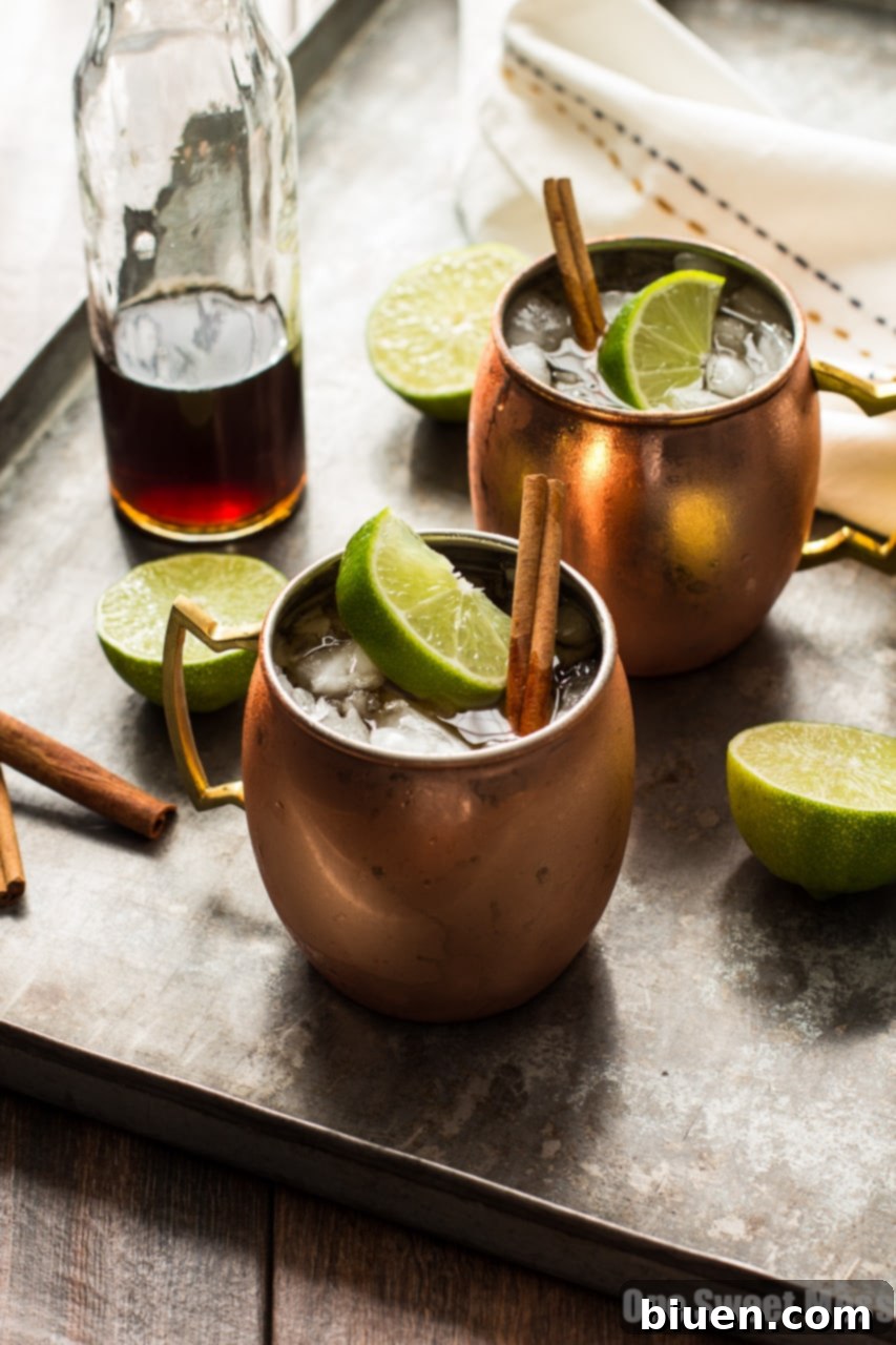The Mid-Winter Mule: This bourbon-infused cocktail combines fruity Pimm's No.1, ginger beer, and homemade cinnamon simple syrup, served in a copper mug.
