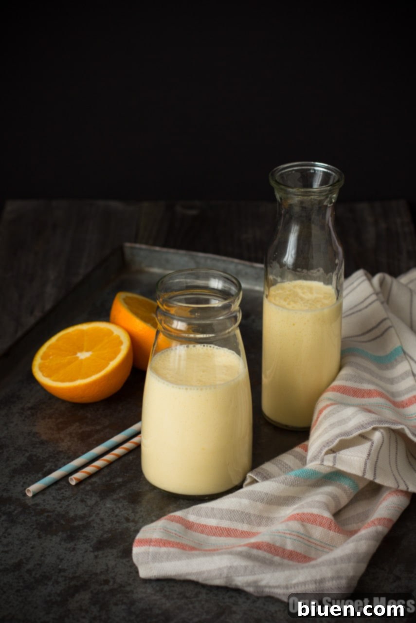 Dreamsicle Smoothie | This orange and vanilla-infused smoothie is ultra thick, rich in protein, and super healthy.
