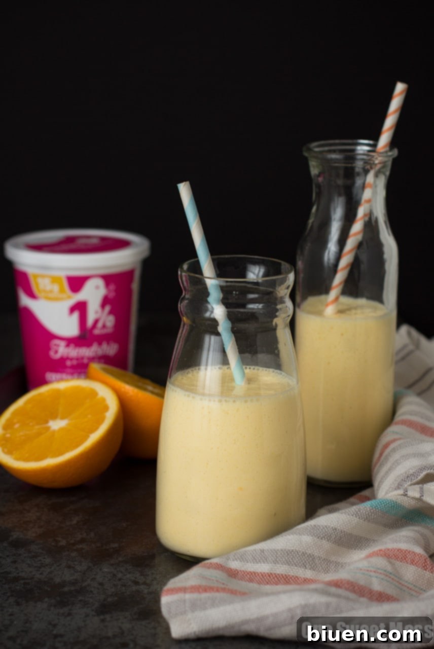 Dreamsicle Smoothie | This orange and vanilla-infused smoothie is ultra thick, rich in protein, and super healthy.